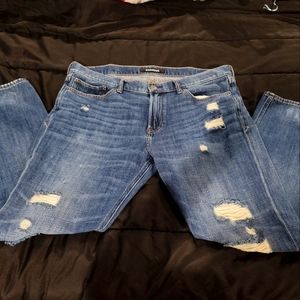 Gently used Men's Express ripped jeans 38x32